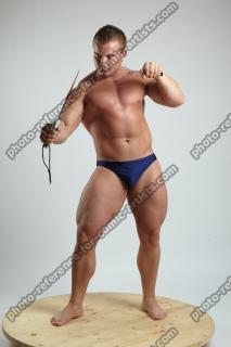 ADAM_WARD STANDING WITH TWO KNIVES